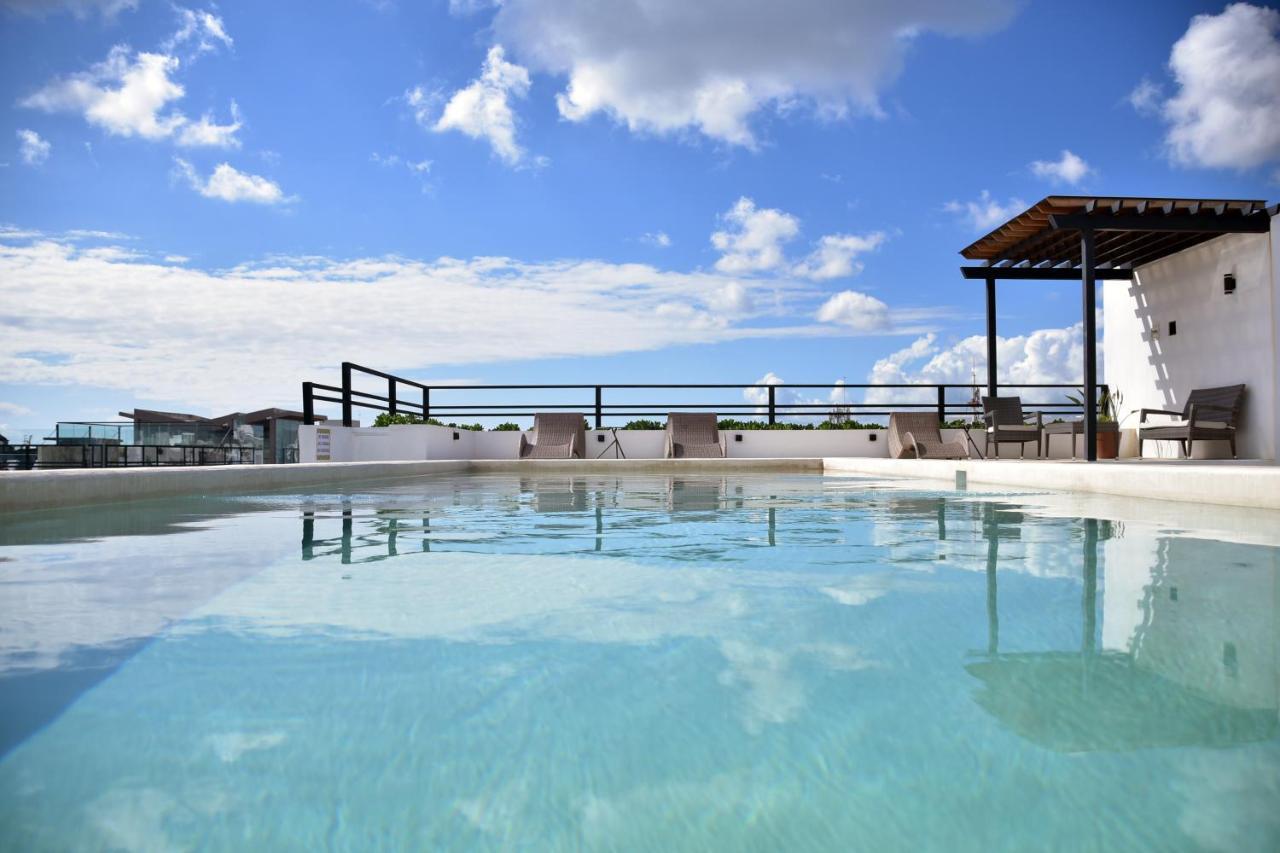 Rentas Vacacionales Torre Diez ปลายาเดลการ์เมน ภายนอก รูปภาพ
